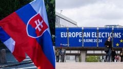 Na snímke vlajka Slovenska a pútač v Bruseli na eurovoľby.